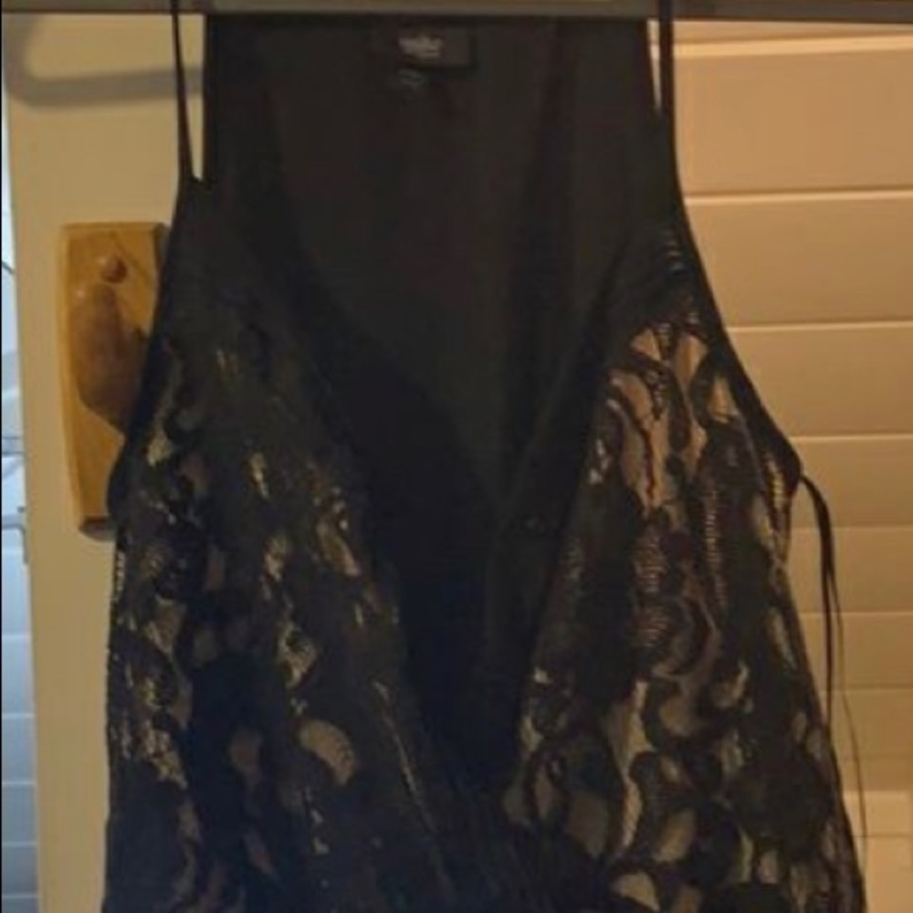 Jumpsuit Mossio Black & nude w/a nude see through lace top . Spaghetti straps.